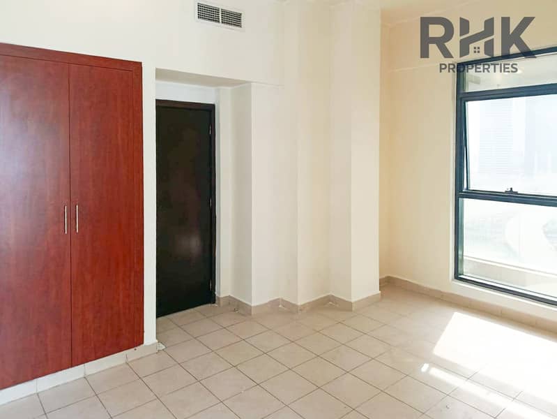 4 Bedroom with built-in wardrobe and large window in Jumeirah Lakes Towers apartment