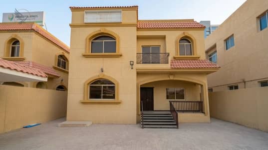 Villa for Rent in Al Rawda, Ajman - فيلا تجارية للإيجار في الروضة 1 عجمان 5 غرف ومجلس وصالة وغرفة خادمة مع باركن داخلي مغطى ومساحة داخلية كبيرة 2. jpeg