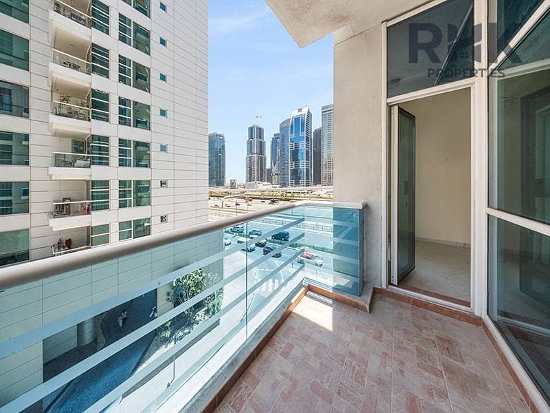 12 Balcony overlooking Dubai Marina skyline and Sheikh Zayed Road