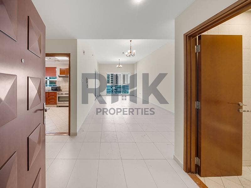 10 Entrance hallway leading to open living area in Dubai Marina apartment