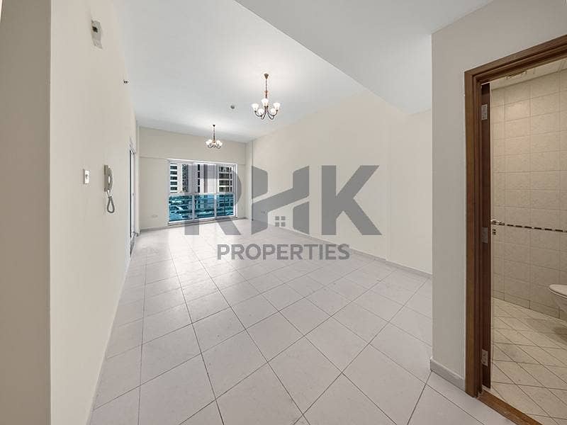 13 Open-plan living and dining area with natural light in Dubai Marina apartment