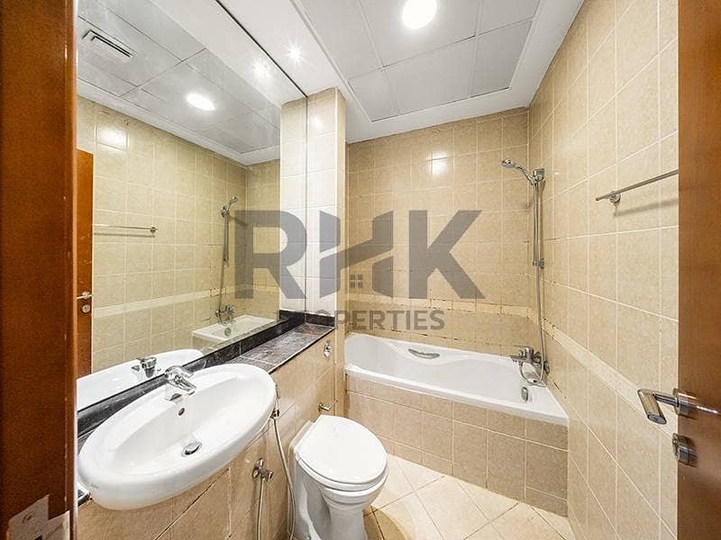 17 Full bathroom with bathtub and shower in Dubai Marina apartment