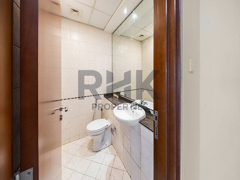 18 Guest bathroom with toilet and vanity in Dubai Marina apartment
