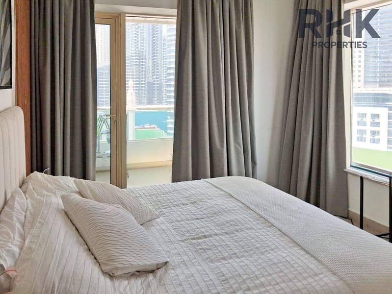 5 Bedroom with upholstered headboard, wood panel wall and balcony door, Marina apartment