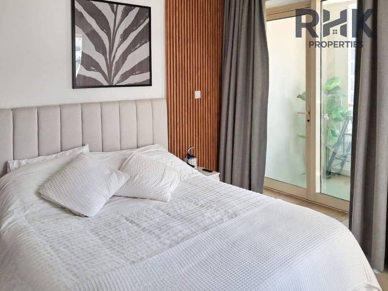 6 White king bedroom with wood slat feature wall in furnished Dubai Marina flat