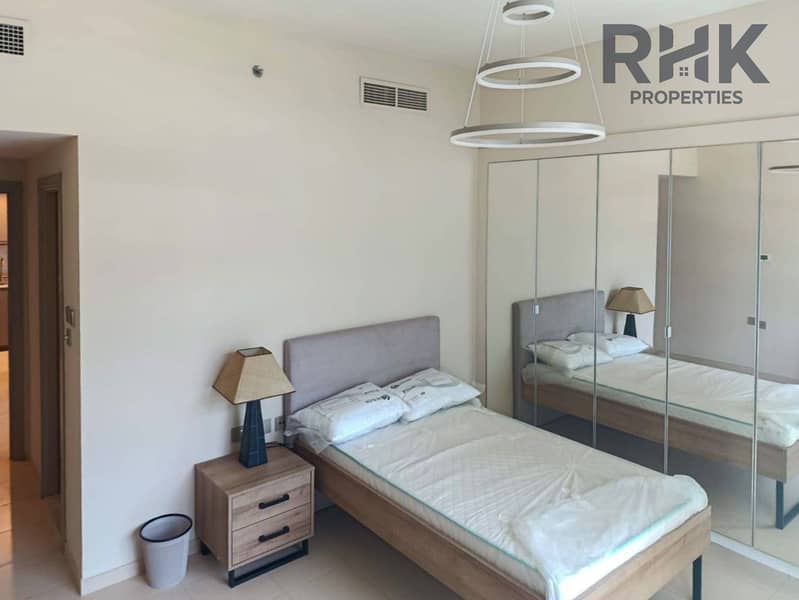 7 Second bedroom with single bed and mirrored wardrobe in furnished Marina apartment Dubai