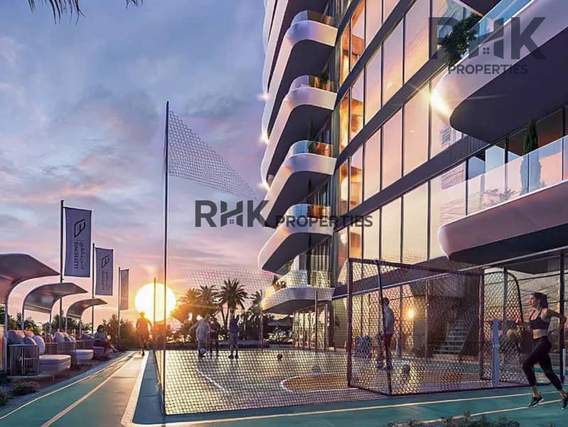 6 Luxury Dubai tower at sunset with rooftop sports court and running track