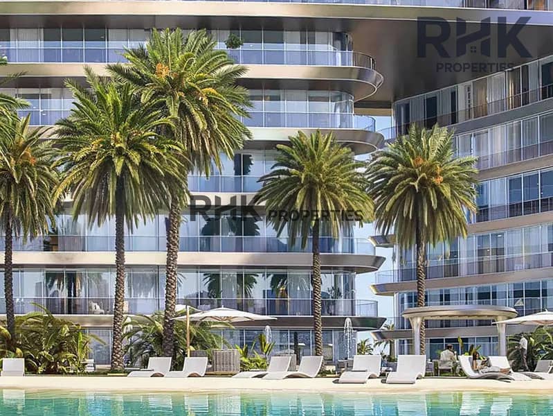 9 Luxury Dubai apartment tower facade with palm trees and swimming pool view