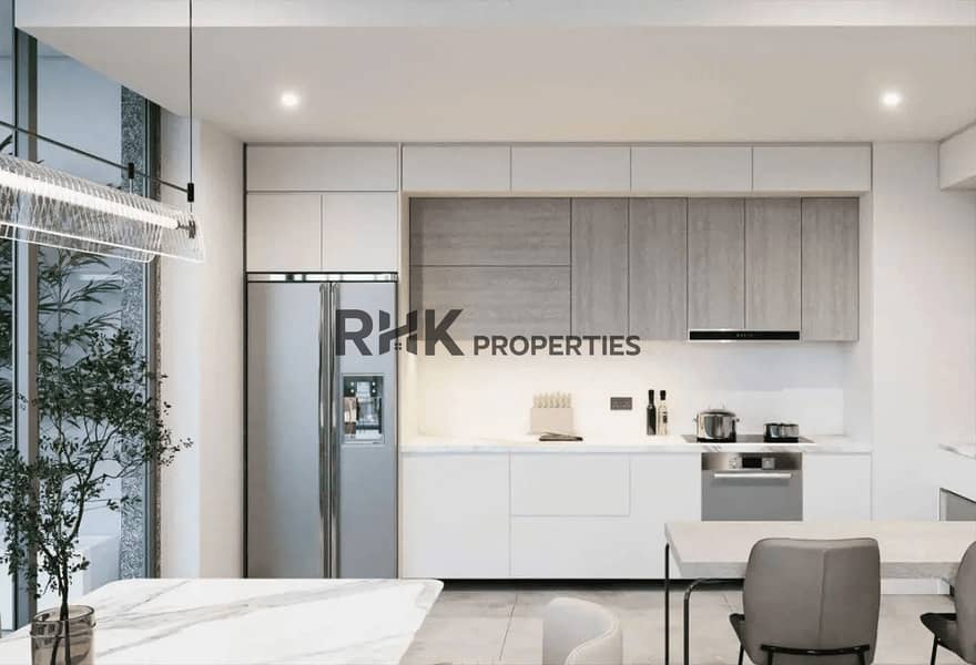 3 Modern fitted kitchen with marble island in Sobha One apartment Dubai