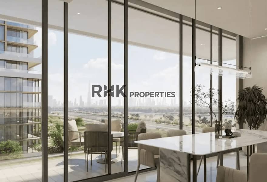 5 Sobha One balcony dining area with Downtown Dubai skyline and creek views