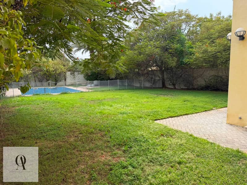 12 Garden area 2 and swimming Pool. jpg