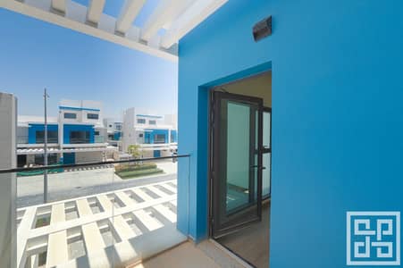 4 Bedroom Townhouse for Rent in DAMAC Lagoons, Dubai - 20 - Balcony (Community View). jpg