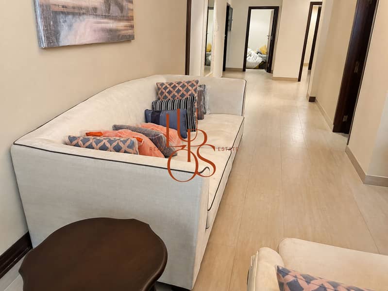 4 Marina_Apartment_14_Living_Room_Sofa_Area. jpg