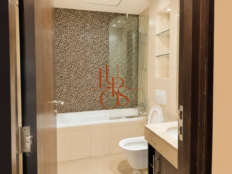 11 Marina_Apartment_23_Bathroom_Shower_View. jpg