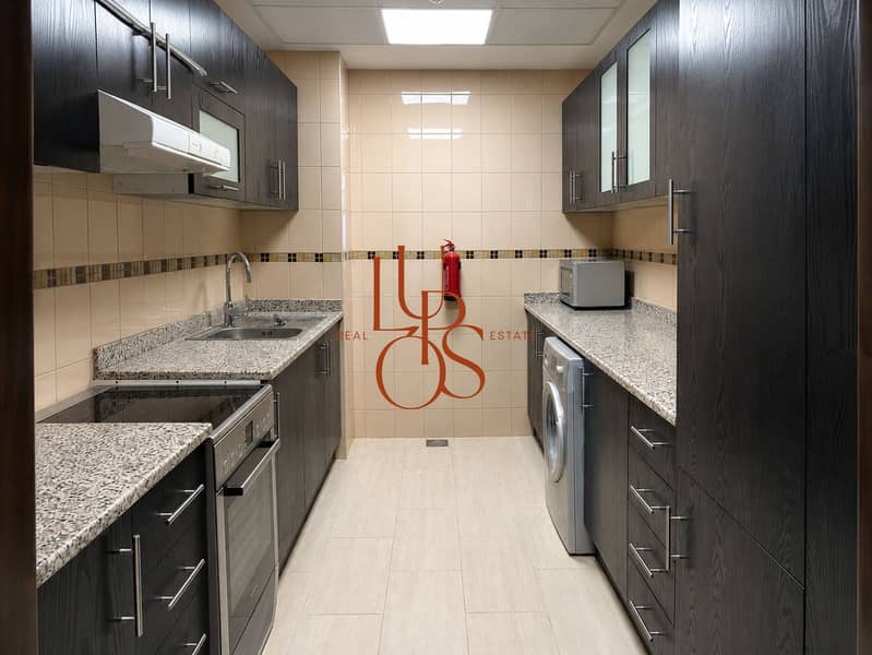 27 Marina_Apartment_08_Galley_Kitchen. jpg