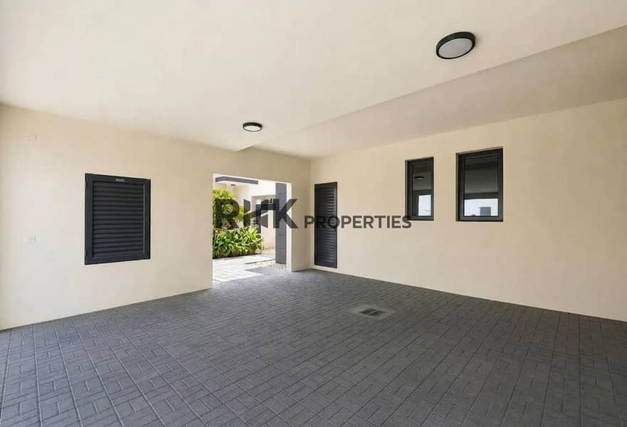 2 Covered double carport with direct villa entry and ventilation windows in Dubai community
