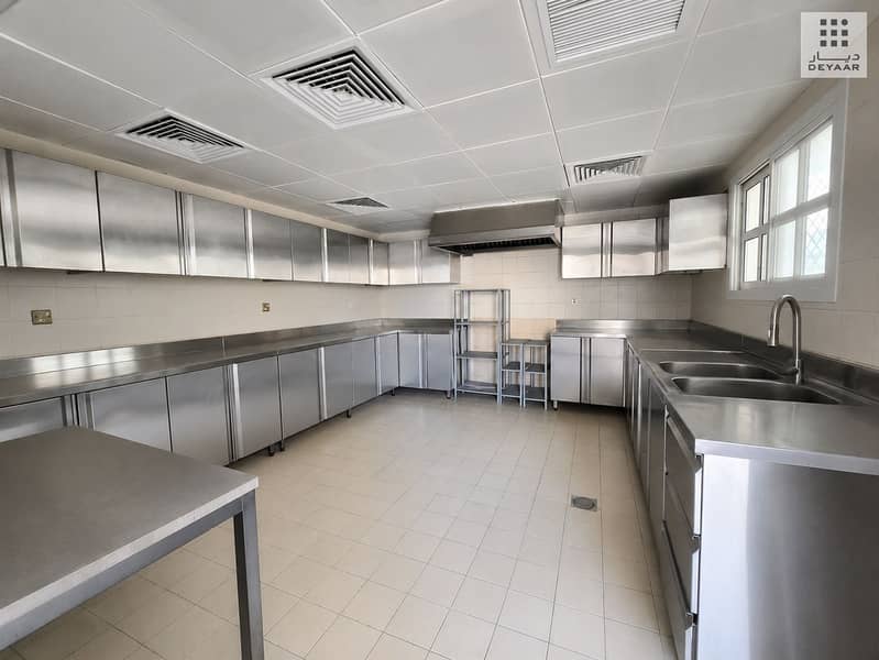 14 09_Stainless_Steel_Kitchen. png