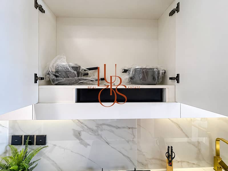 14 Studio_13_Kitchen_Cookware_Cabinet. jpg