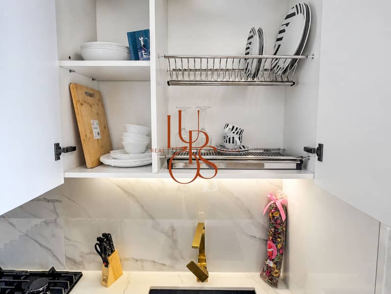 15 Studio_14_Kitchen_Dish_Storage_Sink. jpg