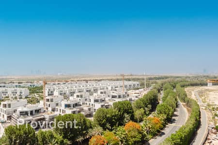 فلیٹ 1 غرفة نوم للبيع في مجان، دبي - شقة في بارادايس فيو 1،مجان 1 غرفة 1250000 درهم - 16317667