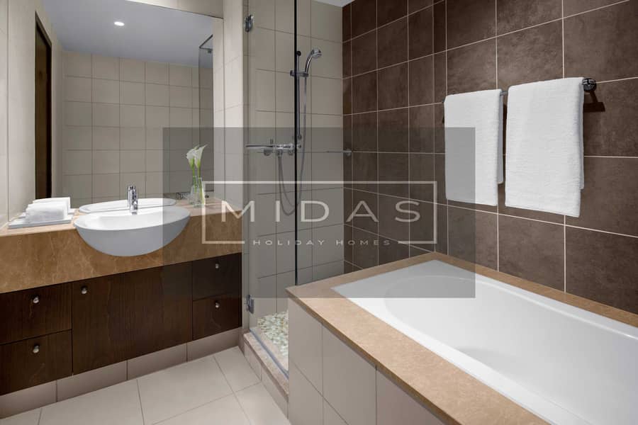 5 Two Bedroom Residence Suite with Creek and urban View - Guest Bathroom. JPG