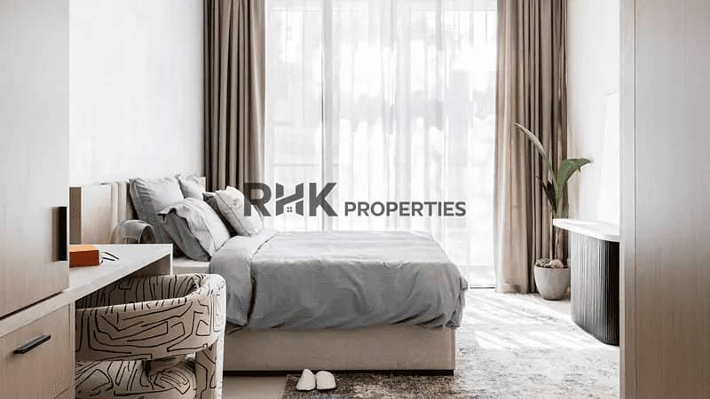 3 Luminar Tower Dubai apartment bedroom with floor-to-ceiling windows and neutral tones