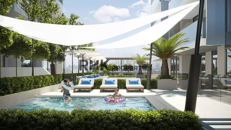 10 Luminar Tower Dubai kids' pool with shaded loungers and family-friendly landscaped area