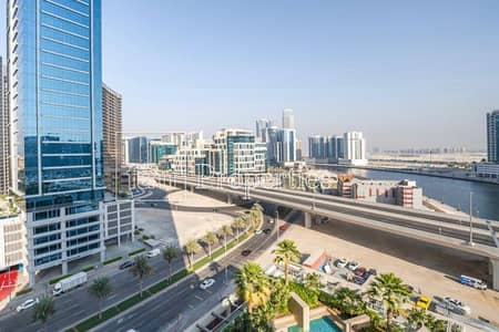 Studio for Sale in Business Bay, Dubai - Canal View Tower B | Furnished | High Floor Burj