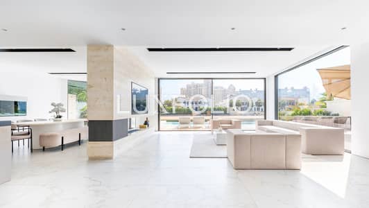 5 Bedroom Villa for Sale in Palm Jumeirah, Dubai - Luxury Beachfront Villa| Upgraded Atrium Entry | Extended Plot