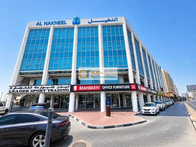 阿尔卡拉马， 迪拜 写字楼待租 - Al Nakheel Building front. png