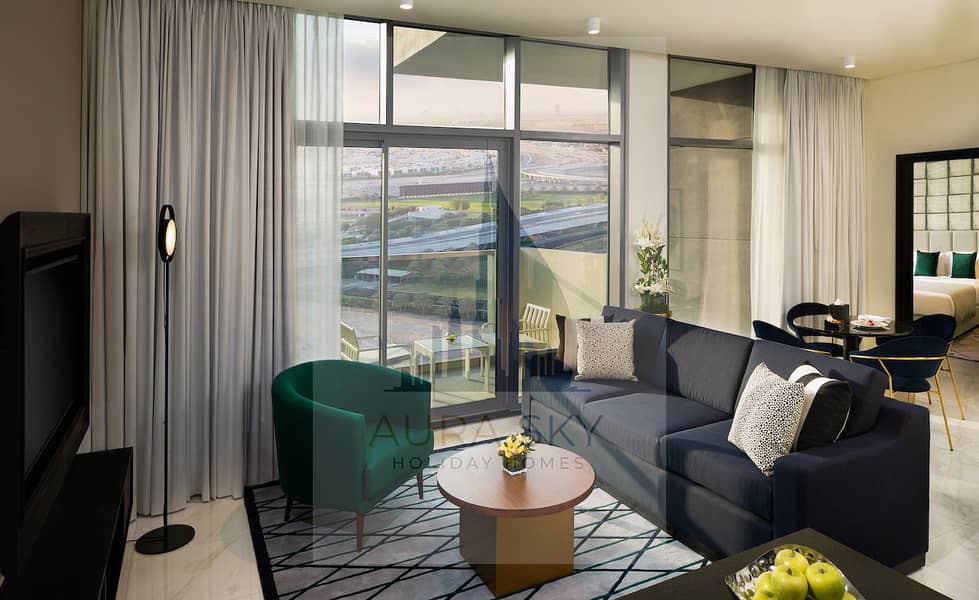2 MABB Premium 1 Bedroom Apt Living Room daytime. jpg