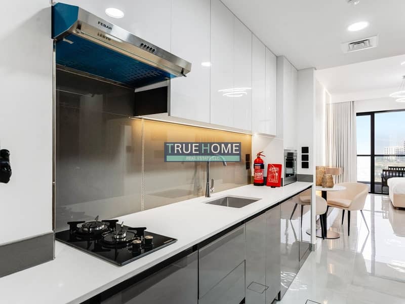 9 kitchen-in-a-studio-apartment-for-sale-in-OST-Tower-11-Majan. jpg
