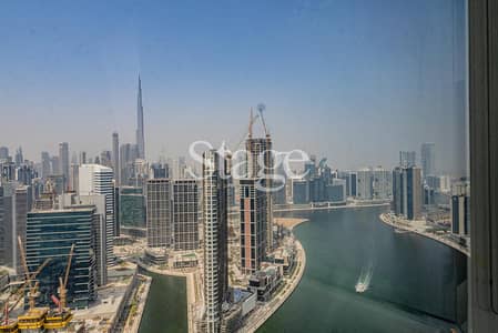 Office for Rent in Business Bay, Dubai - Corner Office | High Floor | Furnished |Canal View