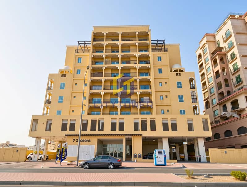 2 International City-Warsan-7 Season Building. jpg