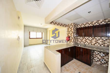 Studio for Rent in International City Phase 2 (Warsan 4), Dubai - International-City-Warsan-Studio-Apartment-Open-Kitchen-Area. jpg