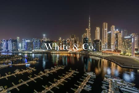 1 Bedroom Flat for Sale in Business Bay, Dubai - Corner Unit | Canal & Burj View | Brand New