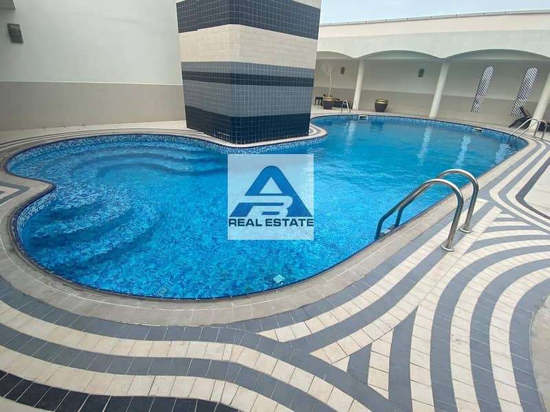 Two beds with Pool & Gym near Wahda Mall Two beds with Pool & Gym near Wahda Mall