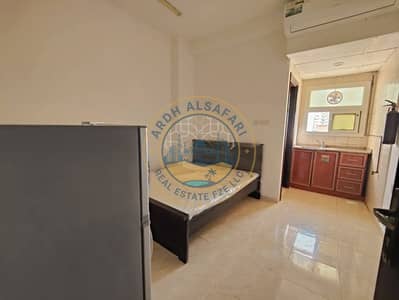 Studio for Rent in Bu Tina, Sharjah - f2b8a573-aa5e-40f4-89ac-8b646ecf7175. jpeg Studio for Rent in Bu Tina, Sharjah - f2b8a573-aa5e-40f4-89ac-8b646ecf7175. jpeg