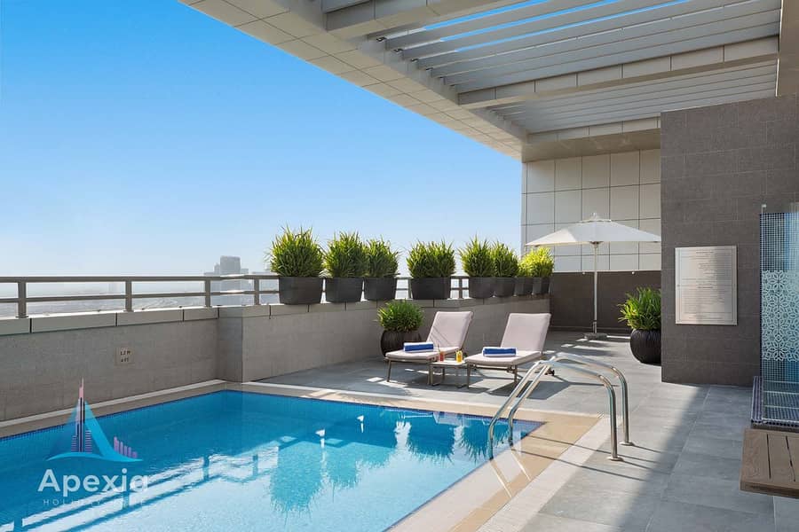 9 hotel-Swimming-Pool-with-Burj-Khalifa-View-2. jpg