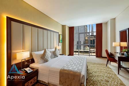 1 Bedroom Hotel Apartment for Rent in Business Bay, Dubai - 1-Bedroom-Apartment-Family-hotel-apartments-Business-Bay-Dubai-Canal-View-and-Burj-Khalifa-View. jpg