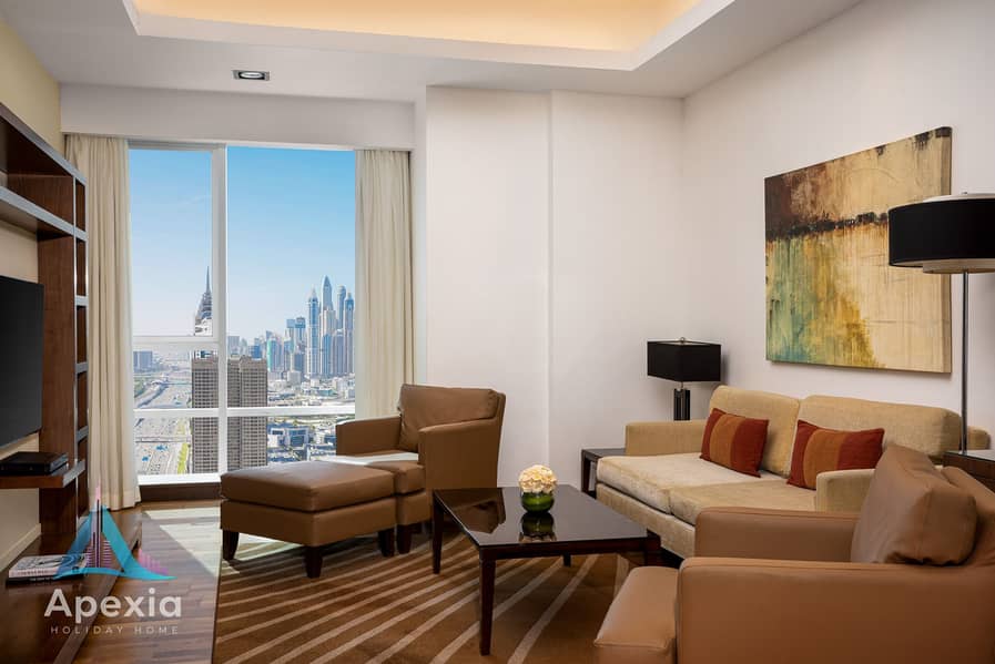 5 Deluxe Two Bedroom Apartment_Living Room. jpg