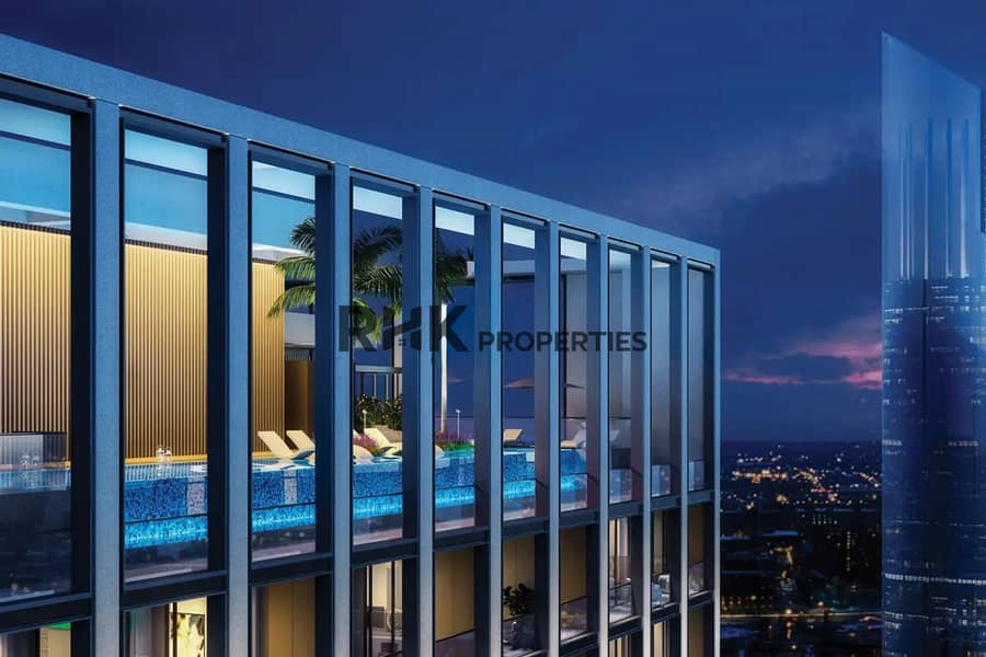 10 Rooftop infinity pool with Dubai city skyline views at night luxury apartment building