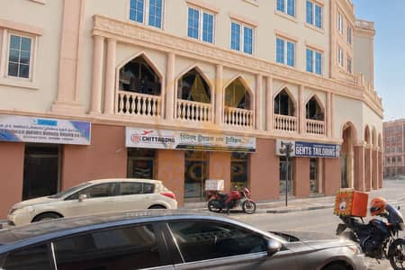 محل تجاري  للبيع في المدينة العالمية، دبي - محل تجاري في Z-04،حي انجلترا،المدينة العالمية 509135 درهم - 16426150