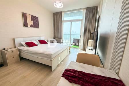 Studio for Rent in Jumeirah Village Circle (JVC), Dubai - Fully Furnished | High Floor | Prime Location