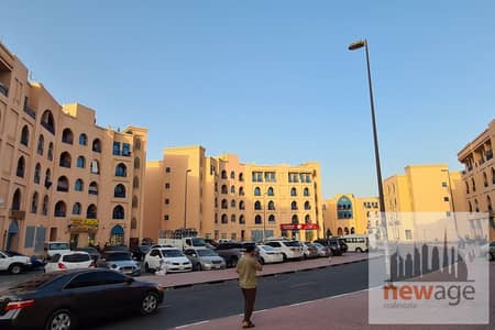 Studio te Huur in International City, Dubai - Persia Cluster Building Pic. 02. jpg