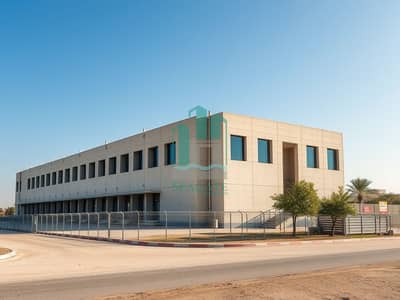 Labour Camp for Rent in Al Jurf, Ajman - An_exterior_view_of_a_labor_camp_located_in_the_UAE_showcasing_a_large_block_structure_made_of_concrete_with_a_modern_design. _The_building_has_prominent_windows_and_is_set_against_a_clear_blue_sky. _The_area_around_th. jpeg