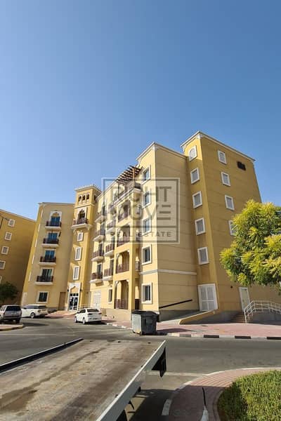 1 Schlafzimmer Wohnung zum Miete in International City, Dubai - emarati-building-emr-26-24266_xl. jpg