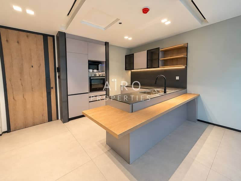 6 wide_angle_clean_modern_empty_apartment_kitchen. png