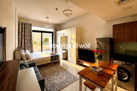 Studio for Rent in Jumeirah Village Circle (JVC), Dubai - 01_COVER_Clean_Studio_Living_Sleeping_Area. jpg