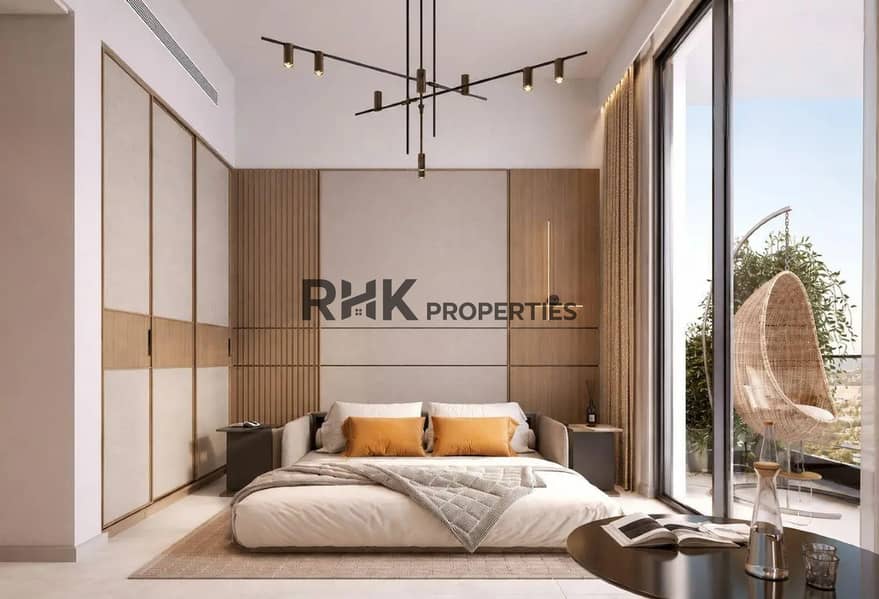 5 Luxury master bedroom interior with wooden headboard wall orange cushions floor-to-ceiling windows balcony Dubai apartment